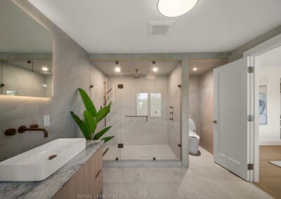 Light oak floating vanity in a Muskoka cottage bathroom