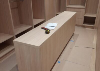 Oak built-in shelving with a drawer base