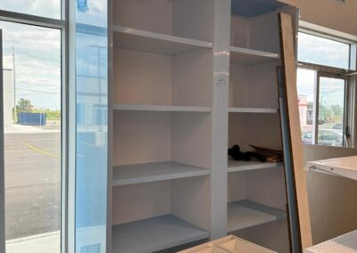 White gloss retail shelving unit, commercial millwork
