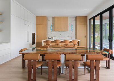 White kitchen with oak accents and an oak-wrapped hood, Mississauga