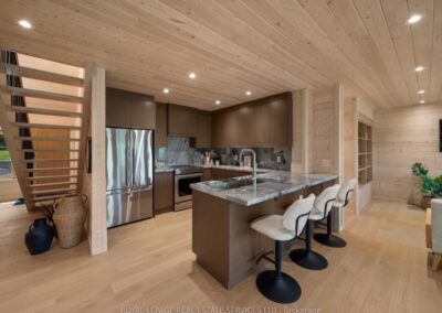 Wood-grain kitchen island with seating, Muskoka cottage